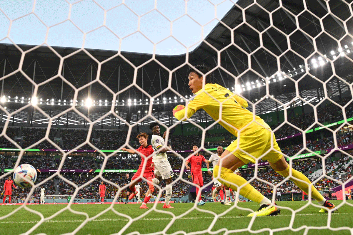 Ghana's Mohammed Kudus scores their team's second goal past South Korea's keeper Seunggyu Kim
