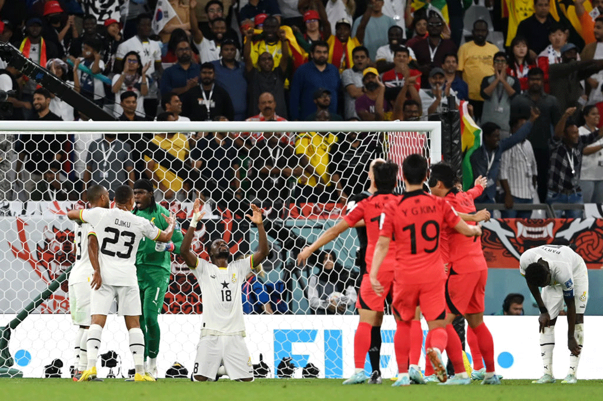 Ghana players celebrate their 3-2 victory over South Korea