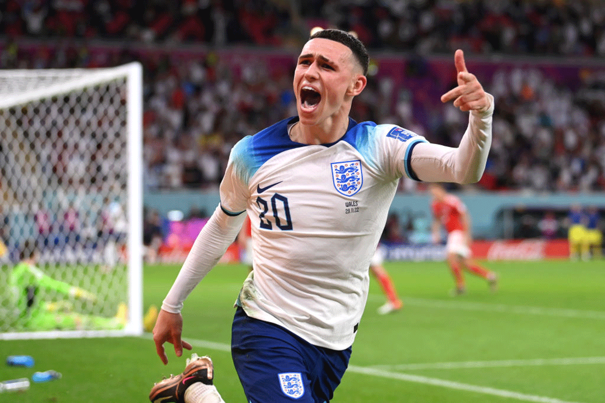 England's Phil Foden celebrates after scoring their team's second goal