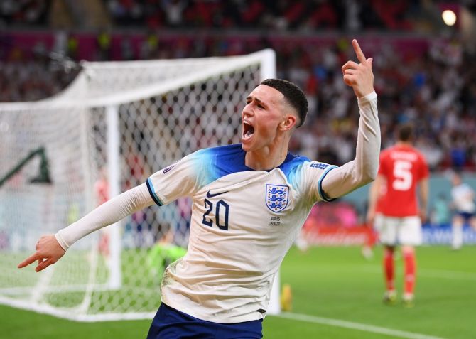 Phil Foden celebrates scoring England's second goal.