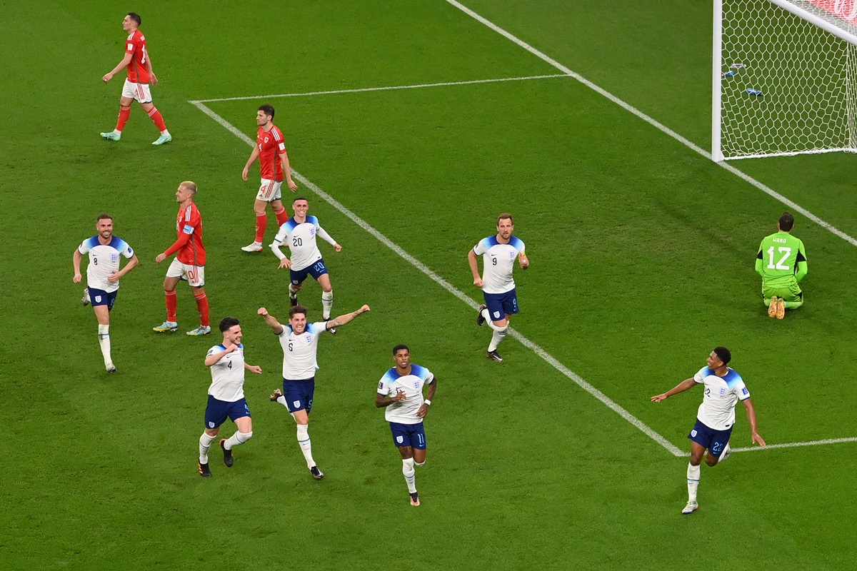 Marcus Rashford celebrates after scoring England's third goal.