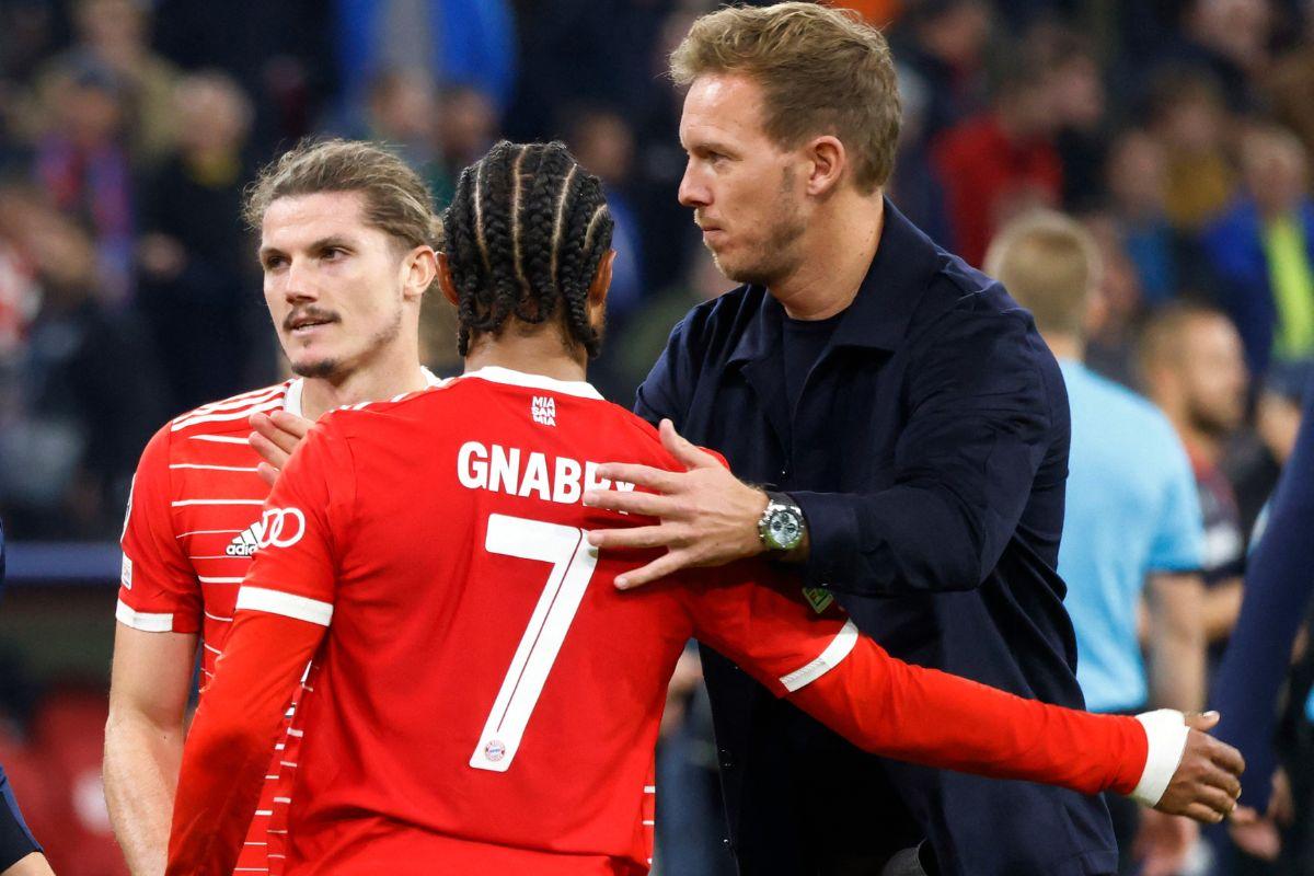 Bayern Munich coach Julian Nagelsmann celebrates with Serge Gnabry and Marcel Sabitzer