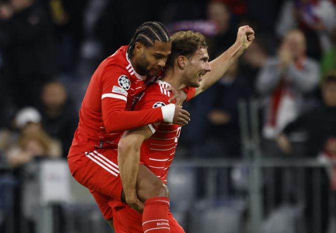 Serge Gnabry celebrates scoring Bayern Munich's second goal with Leon Goretzka in the Champions League Group C match against Viktoria Plzen at Allianz Arena, Munich.