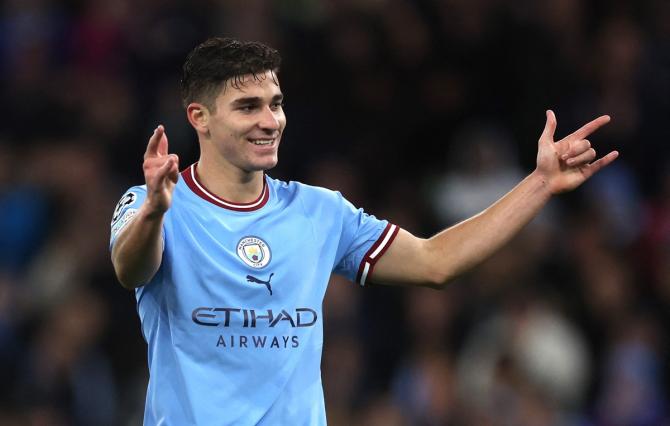 Julian Alvarez celebrates after scoring Manchester City's fifth goal.