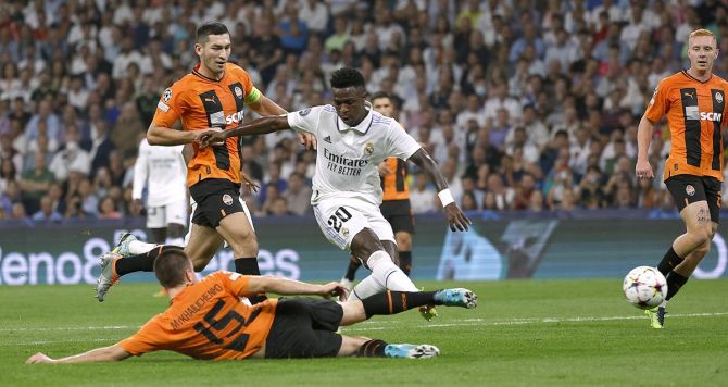 Vinicius Junior scores Real Madrid's second goal in the Champions League Group F match against Shakhtar Donetsk at Santiago Bernabeu, Madrid, Spain.