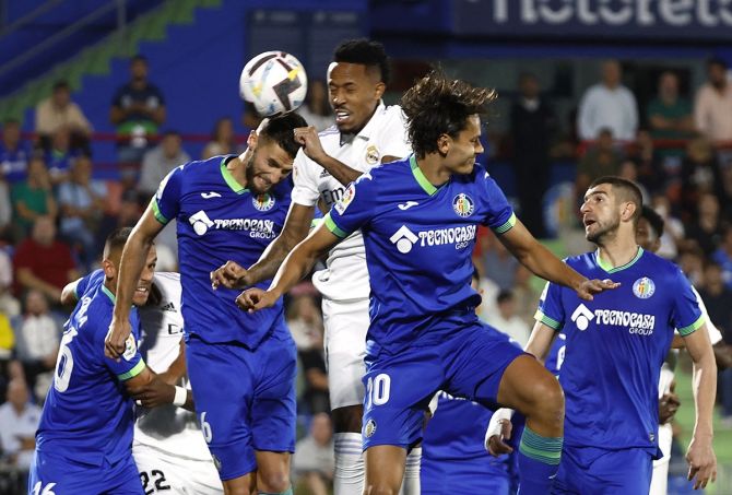 Eder Militao rises above a host of Getafe defenders to head home Real Madrid's only goal of the LaLiga match at Coliseum Alfonso Perez, in Getafe, Spain, on Saturday.