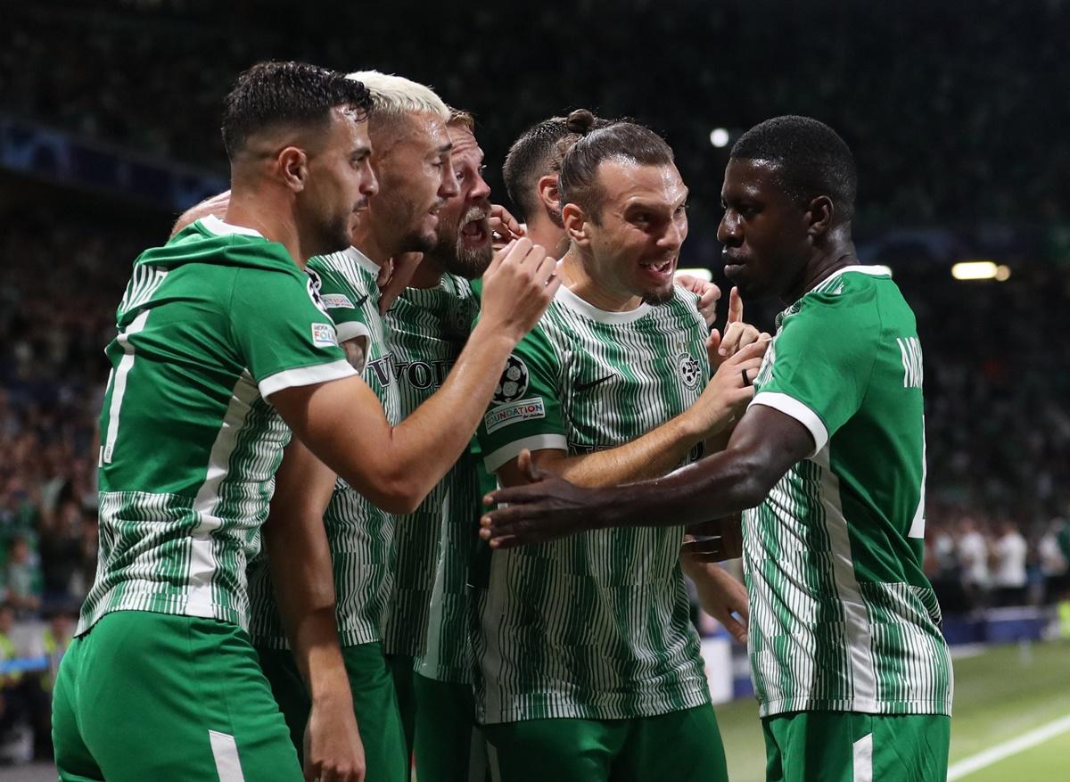 Omer Atzili celebrates scoring Maccabi Haifa's first goal with teammates during the Group H match against Juventus at Sammy Ofer Stadium, Haifa, Israel.