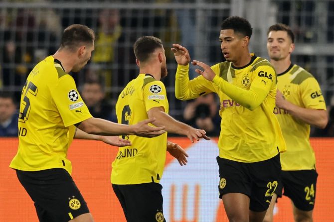 Jude Bellingham celebrates scoring the equaliser for Borussia Dortmund in the Group G match against Sevilla, at Signal Iduna Park, Dortmund, Germany.