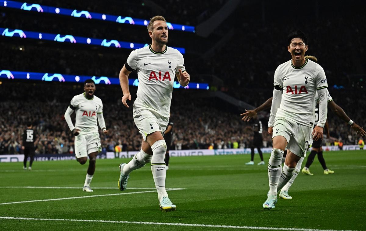 Harry Kane celebrates scoring Tottenham Hotspur's second goal with Son Heung-min in the Champions League Group D match against Eintracht Frankfurt at Tottenham Hotspur Stadium, London.