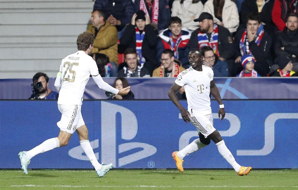 Sadio Mane celebrates scoring Bayern Munich's first goal with Thomas Muller in the Champions League Group C match against Viktoria Plzen at Doosan Arena, Pilsen, Czech Republic on Wednesday.