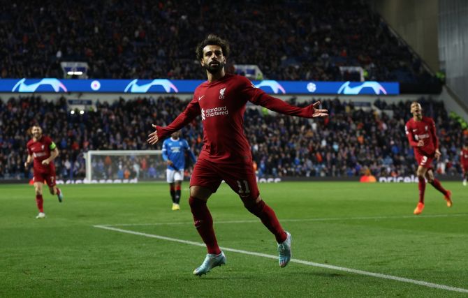 Mohamed Salah celebrates scoring Liverpool's sixth goal in the Champions League Group A match against Rangers at Ibrox Stadium, Glasgow, Scotland, on Wednesday.