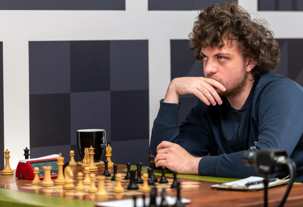 Teenage grandmaster sues world chess champion for defamation