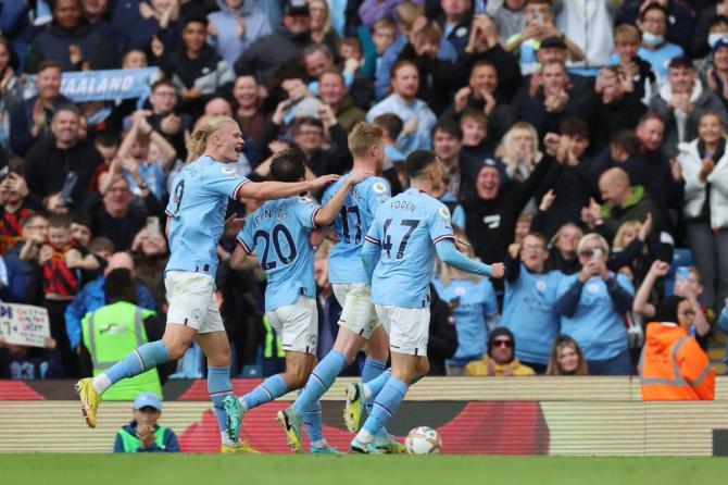 Man City players celebrating a goal