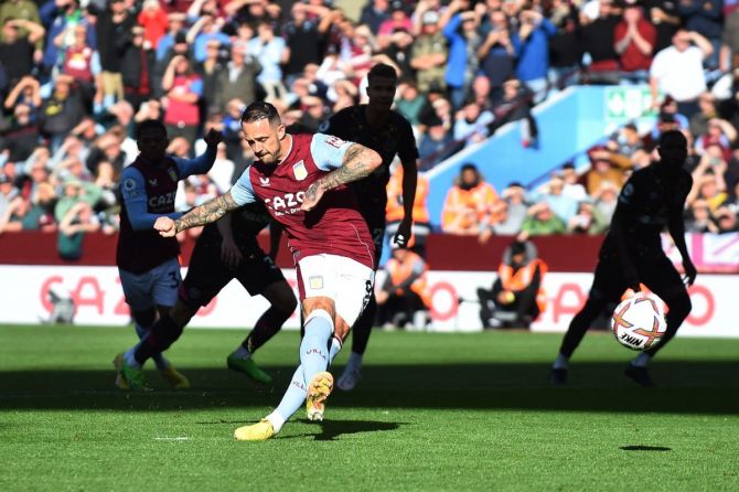 Aston Villa's Danny Ings scores their third goal from the penalty spot