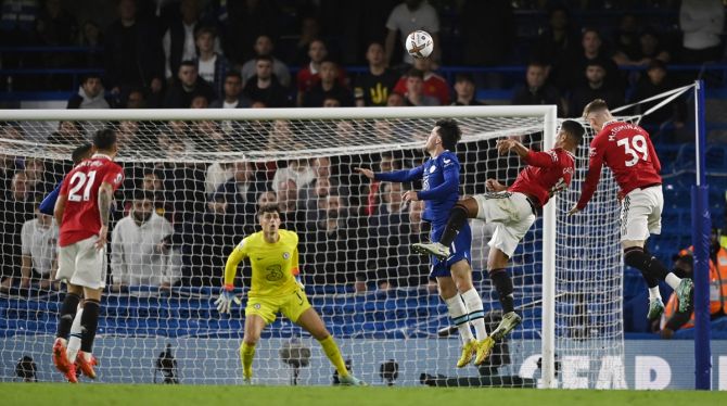 Casemiro rises above a host of defenders to head home the equaliser for Manchester United in the Premier League match against Chelsea at Stamford Bridge, London, on Saturday.