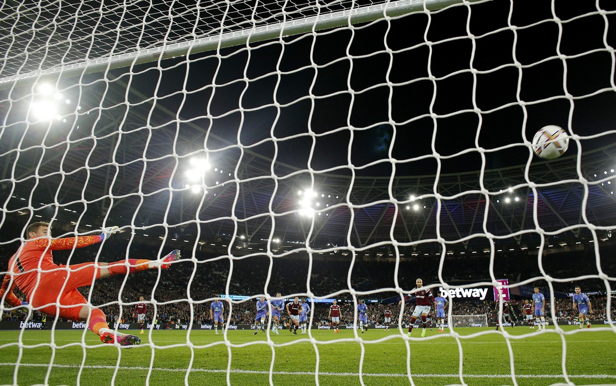 Said Benrahma scores West Ham United's second goal from the penalty spot past AFC Bournemouth's Mark Travers during the Premier League match, at London Stadium, on Monday.