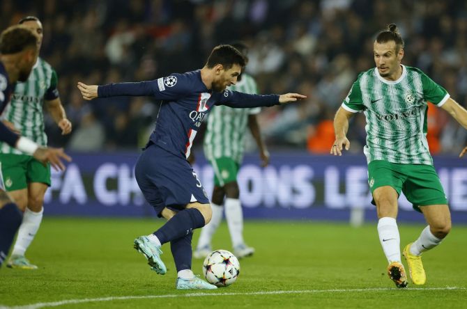 Lionel Messi scores Paris St Germain's fourth goal during the Champions League Group H match against Maccabi Haifa, at Parc des Princes, Paris, France.