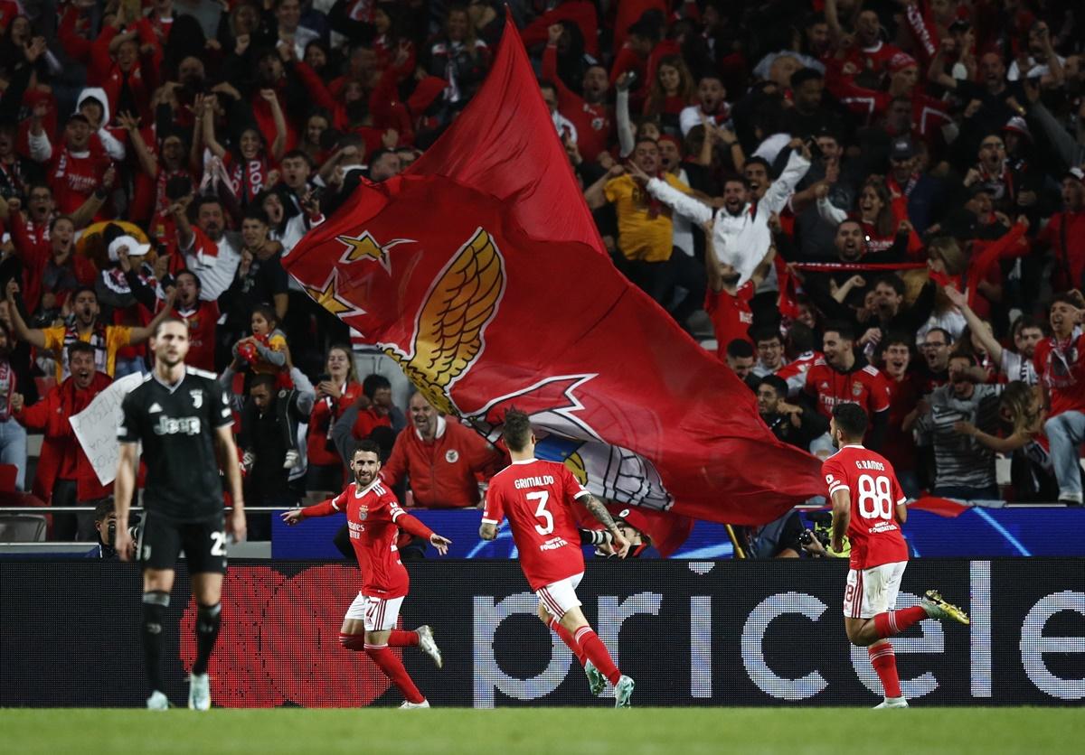 Rafa Silva celebrates scoring Benfica's fourth goal with teammates during the Champions League Group H match against Juventus, at Estadio da Luz, Lisbon, Portugal, on Tuesday.