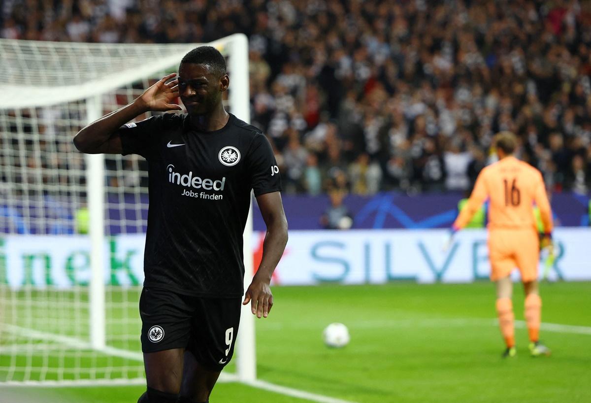 Randal Kolo Muani celebrates scoring the winner for Eintracht Frankfurt during the Champions League Group D match against Olympique de Marseille, at Deutsche Bank Park, Frankfurt, Germany.