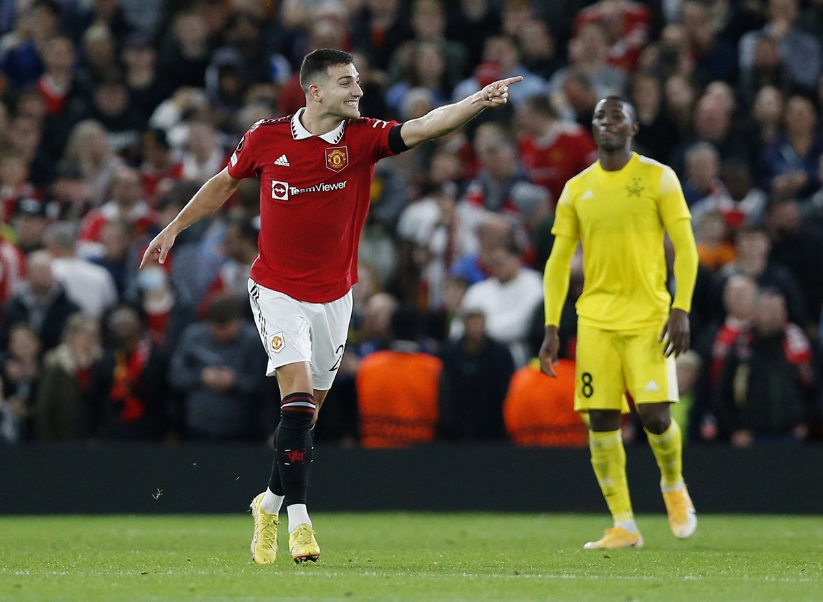 Diogo Dalot celebrates scoring Manchester United's first goal.