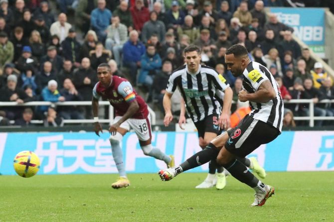 Newcastle United's Callum Wilson scores their first goal from the penalty spot