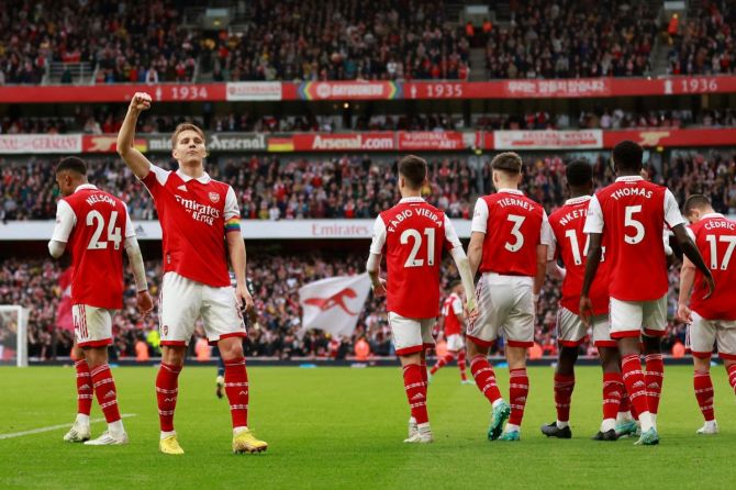 Arsenal's Martin Odegaard celebrates scoring their fifth goal