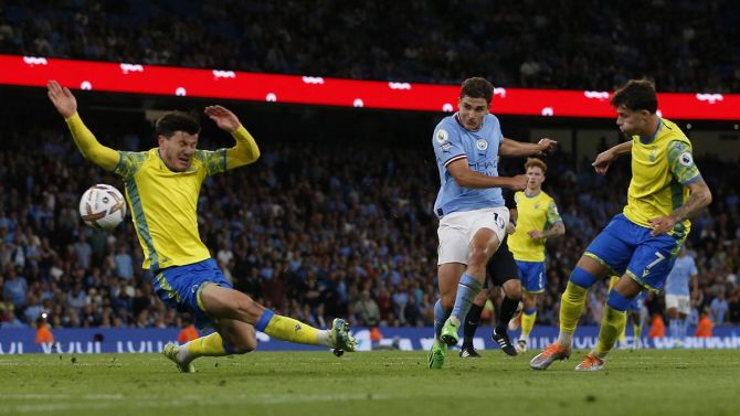 Julian Alvarez scores Manchester City's sixth goal, his second of the match.