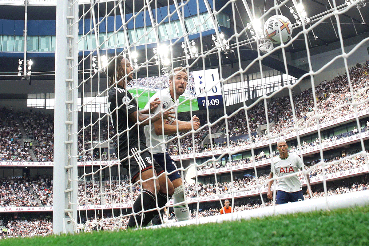 Tottenham Hotspur's Harry Kane scores their second goal against Fulham at Tottenham Hotspur Stadium, London. 