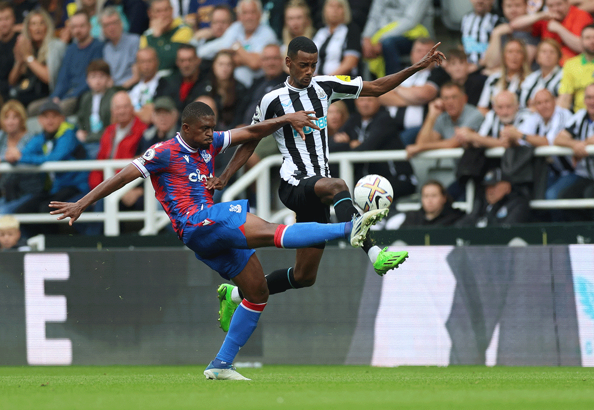 Newcastle United's Alexander Isak in action with Crystal Palace's Cheick Doucoure during their match at  St James' Park, Newcastle