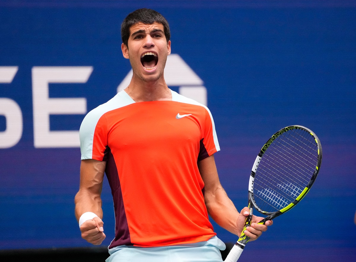 Spain's Carlos Alcaraz reacts after hitting a third set winner against Jenson Brooksby of the United States.