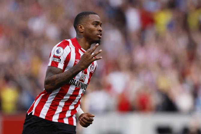 Ivan Toney celebrates scoring Brentford's third goal and completing his hat-trick against Leeds United at Brentford Community Stadium, London.