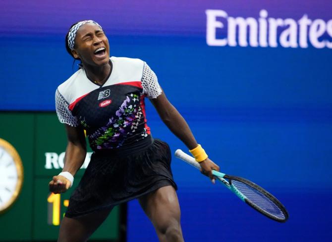 Coco Gauff of the United States reacts after overpowering China's Shuai Zhang.