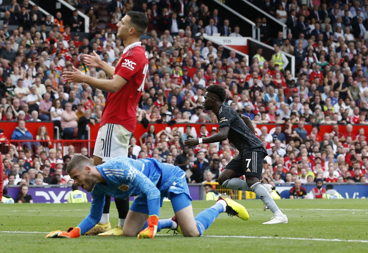 Bukayo Saka celebrates scoring the equaliser for Arsenal.