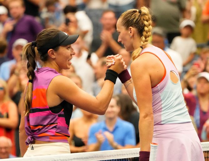 Jessica Pegula of the United States and the Czech Republic's Petra Kvitova meet at the net after their pre-quarter-final.