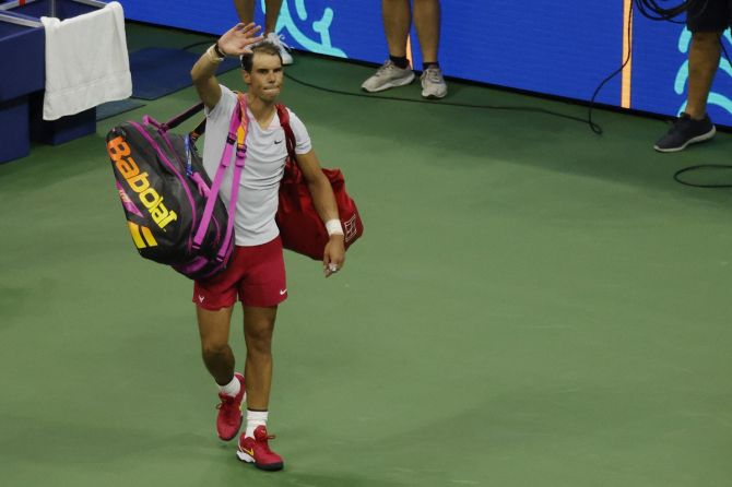 Rafael Nadal waves to the crowd while leaving the court after his shock defeat to Frances Tiafoe at the US Open on Monday.