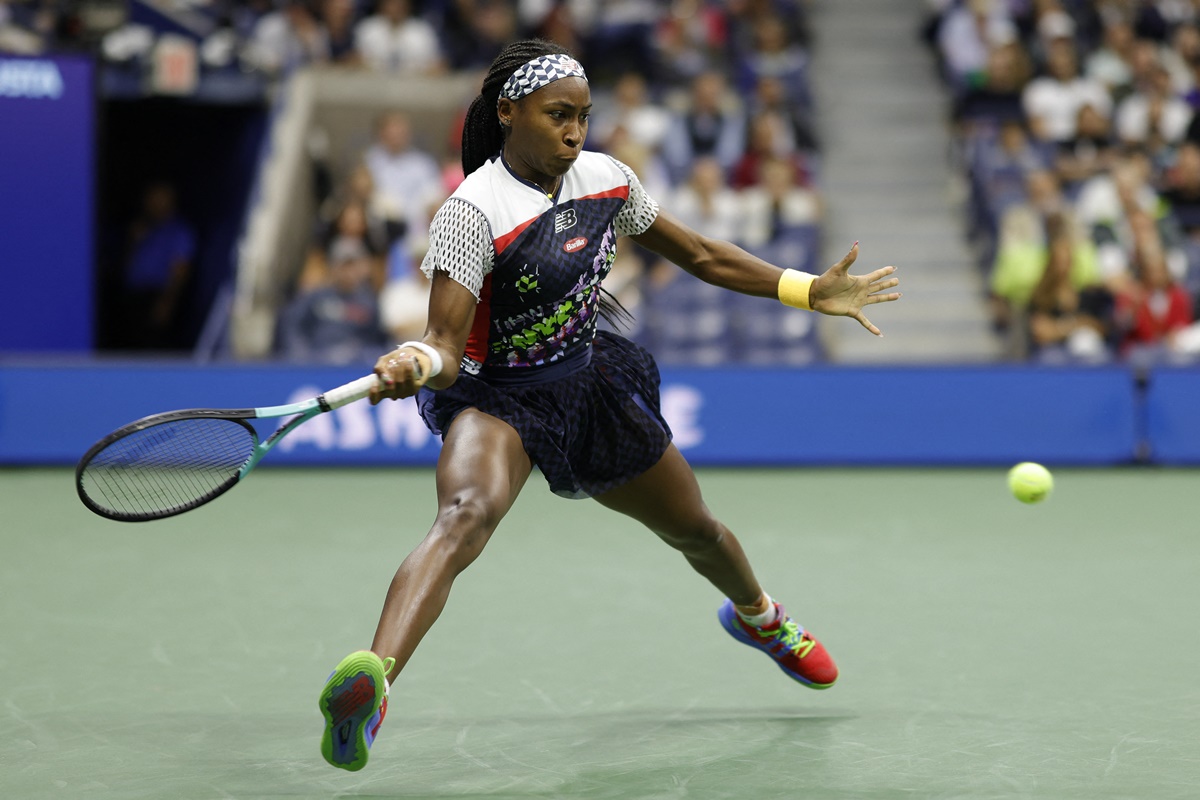 Coco Gauff hits a forehand against Caroline Garcia.