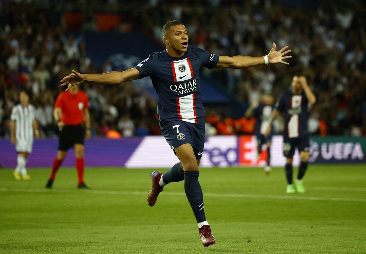 Kylian Mbappe celebrates scoring Paris St Germain's second goal against Juventus in the Group H match at Parc des Princes, Paris, France.