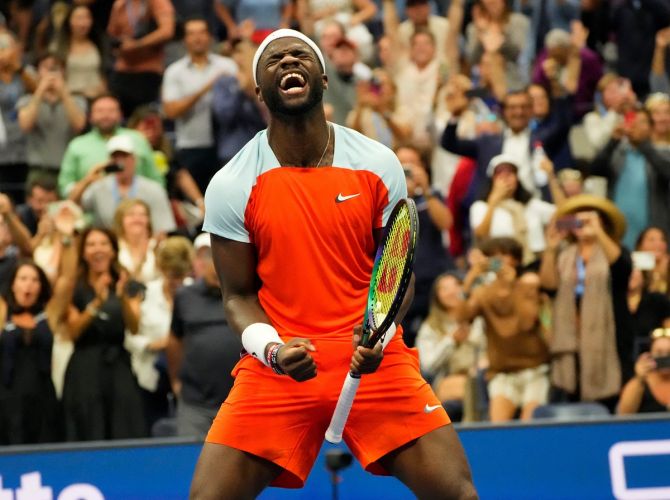 Frances Tiafoe of the United States celebrates beating Russia's Andrey Rublev in the quarter-finals of the US Open at Billie Jean King National Tennis Center on Wednesday.