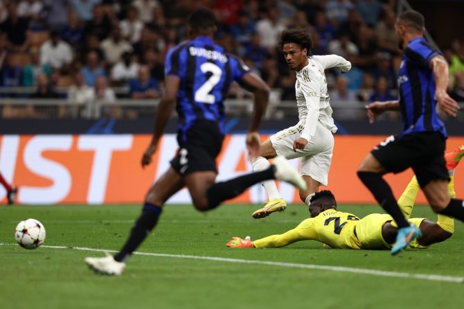 Leroy Sane rounds up Inter Milan goalkeeper Andre Onana to give Bayern Munich the lead in the Champions League Group C at the San Siro Stadium in Milan, Italy.