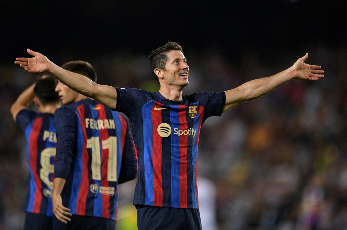 Robert Lewandowski celebrates scoring Barcelona's fourth goal and registering a hat-trick in the Champions League Group C match against Viktoria Plzen, at Camp Nou, Barcelona, Spain, on Wednesday.