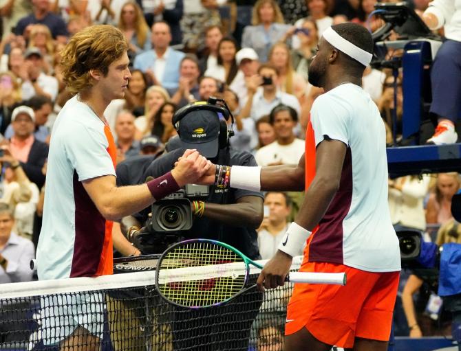 Andrey Rublev congratulates Frances Tiafoe after the match.