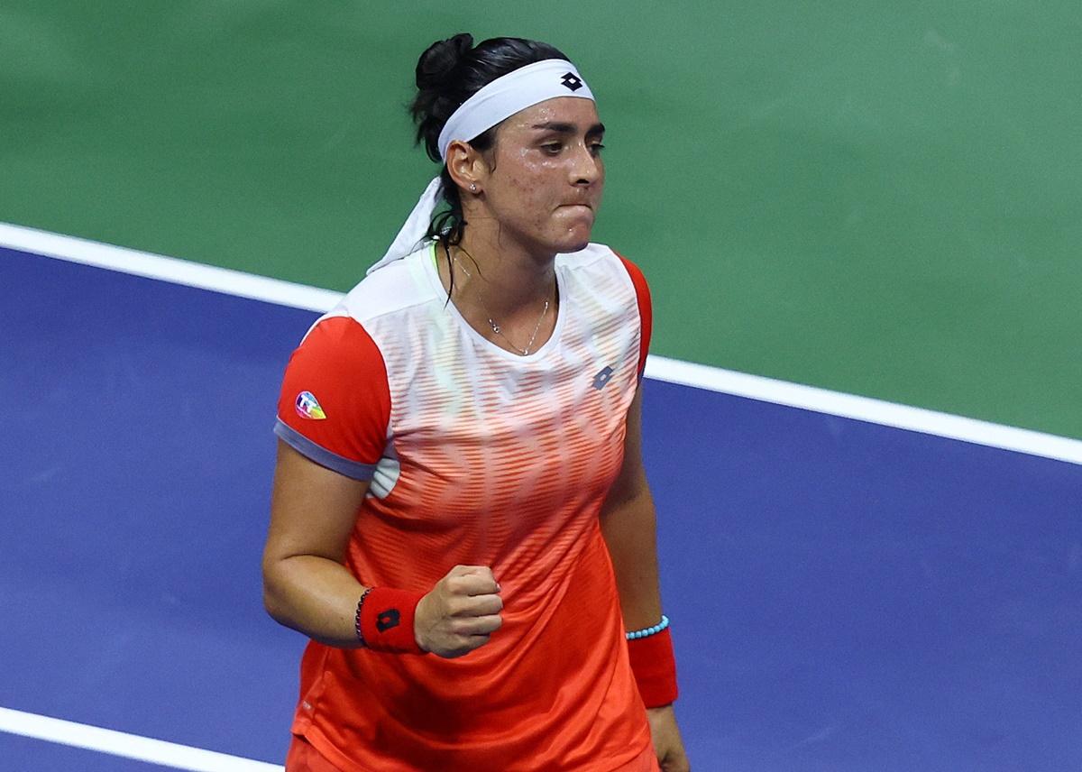 Tunisia's Ons Jabeur celebrates winning her semi-final match against France's Caroline Garcia.