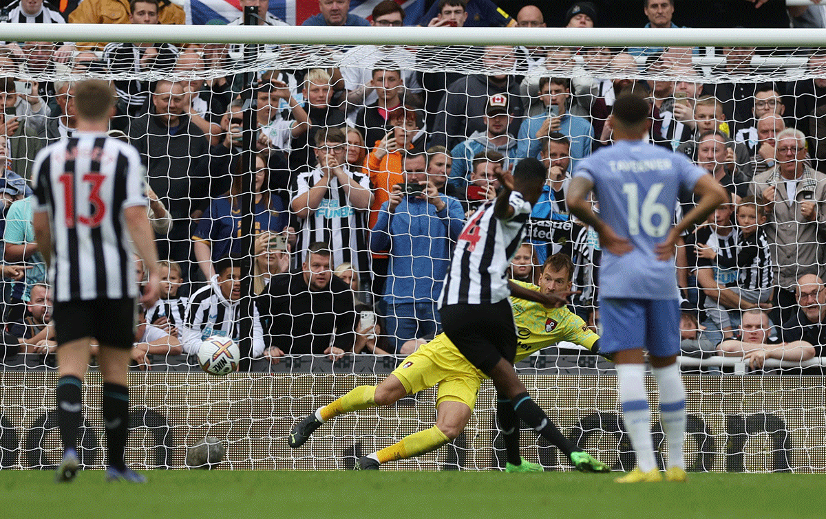 Newcastle United's Alexander Isak scores their first goal from the penalty spot against Bouremouth at St James' Park in Newcastle