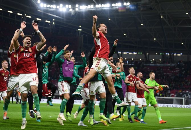 Hungary's players celebrate after beating Germany in the Nations League Group C match at Red Bull Arena, Leipzig, on Saturday.