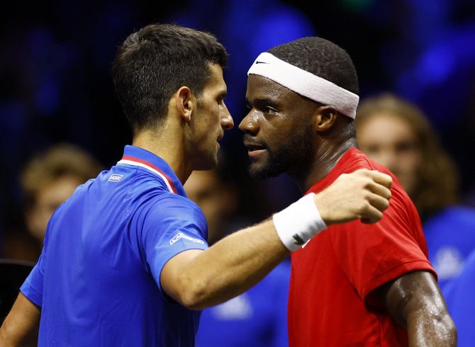Novak Djokovic and Frances Tiafoe embrace after their singles match at the Laver Cup on Saturday