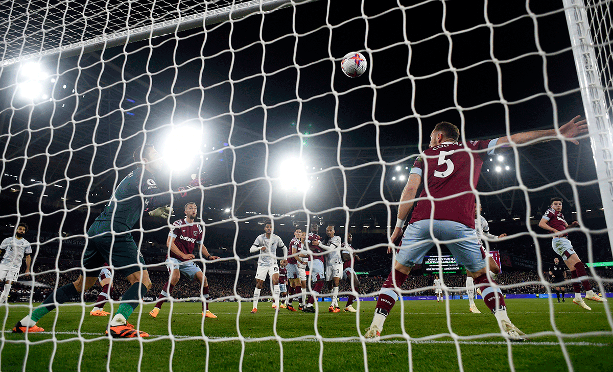 Liverpool's Joel Matip scores the winning goal against West Ham at London Stadium, London