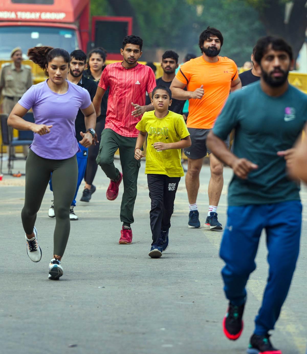 The wrestlers head out for a jog ahead of their protest