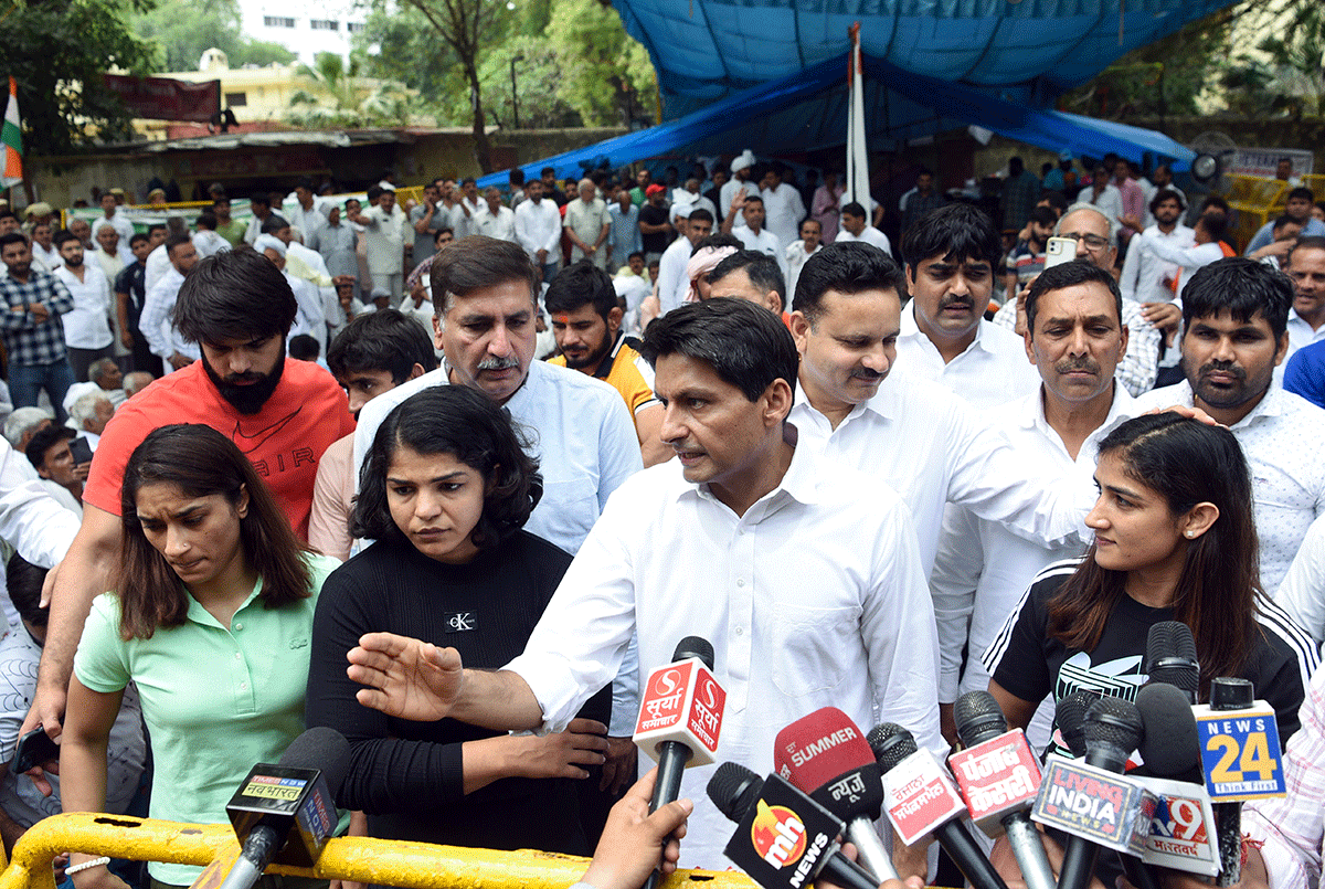 Congress leader Deepender Singh Hooda speaks to media at the protest site at Jantar Mantar in New Delhi on Friday.