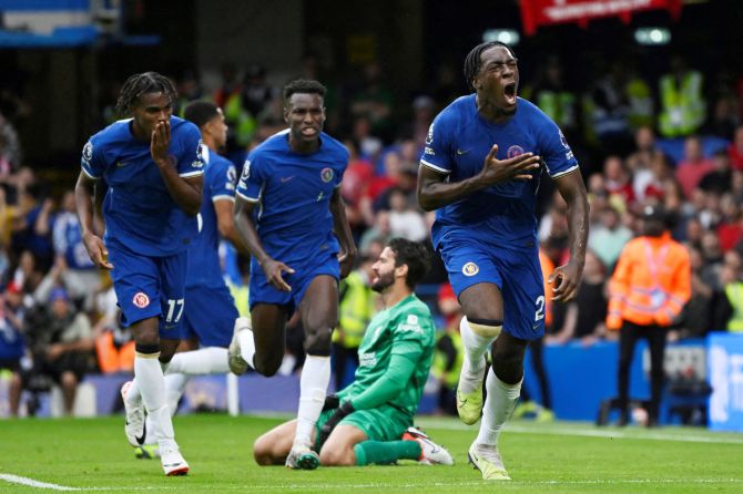 Chelsea's Axel Disasi celebrates scoring their first goal against Liverpool at Stamford Bridge  