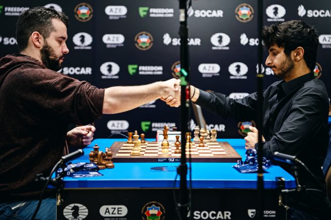 India's Vidit Gujrathi (right) defeated Nepomniachtchi 2-0 in 10-minute games to advance to the FIDE Chess World Cup last eight